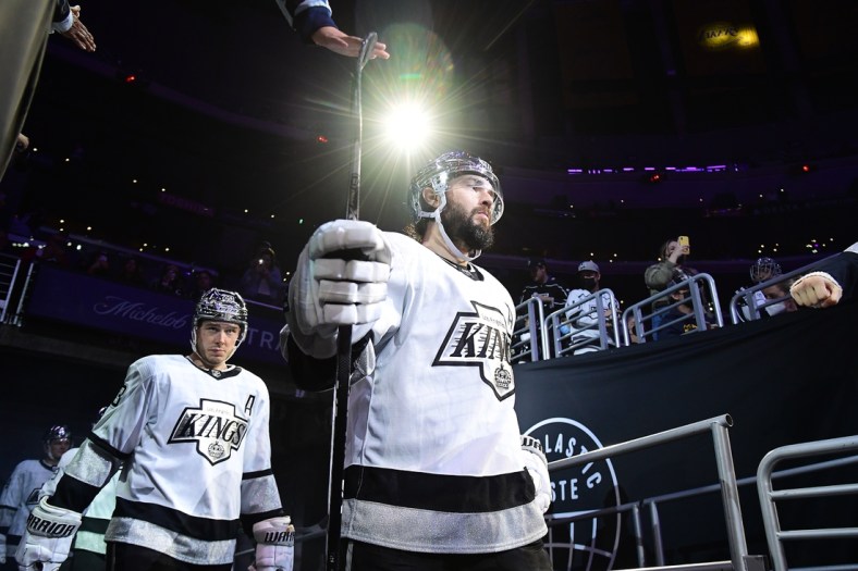 Jan 20, 2022; Los Angeles, California, USA; Los Angeles Kings defenseman Drew Doughty (8) and right wing Dustin Brown (23) before playing against the Colorado Avalanche in the third period at Crypto.com Arena. Mandatory Credit: Gary A. Vasquez-USA TODAY Sports