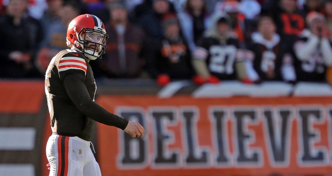 Cleveland Browns quarterback Baker Mayfield (6) walks off the field following an interception during the first half of an NFL football game against the Baltimore Ravens at FirstEnergy Stadium, Sunday, Dec. 12, 2021, in Cleveland, Ohio. [Jeff Lange/Beacon Journal]Browns 6