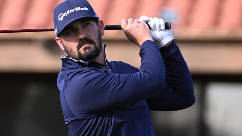 Jan 22, 2022; La Quinta, California, USA; Chad Ramey watches his shot from the 10th tee during the third round of the American Express golf tournament at La Quinta Country Club. Mandatory Credit: Orlando Ramirez-USA TODAY Sports