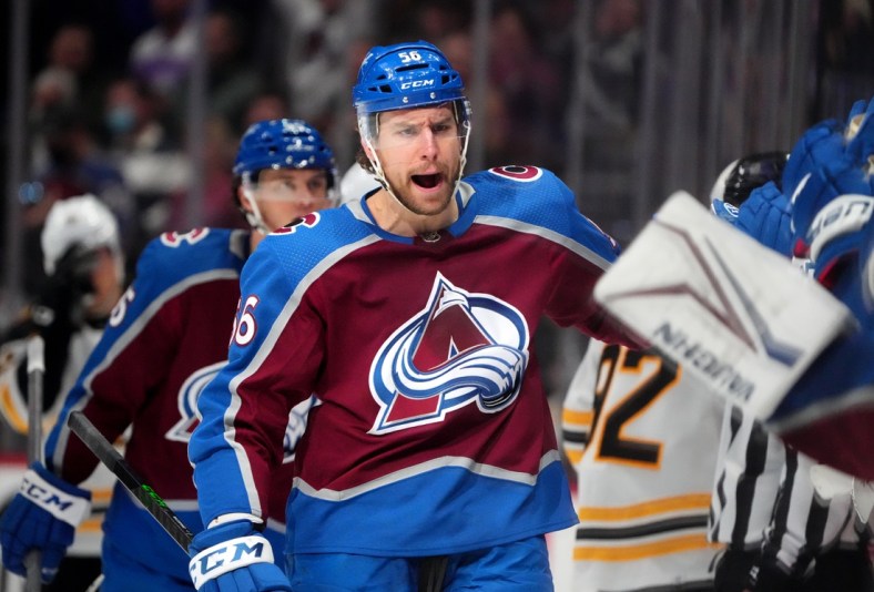 Jan 26, 2022; Denver, Colorado, USA; Colorado Avalanche defenseman Kurtis MacDermid (56) reacts after scoring a goal in the first period against the Boston Bruins at Ball Arena. Mandatory Credit: Ron Chenoy-USA TODAY Sports
