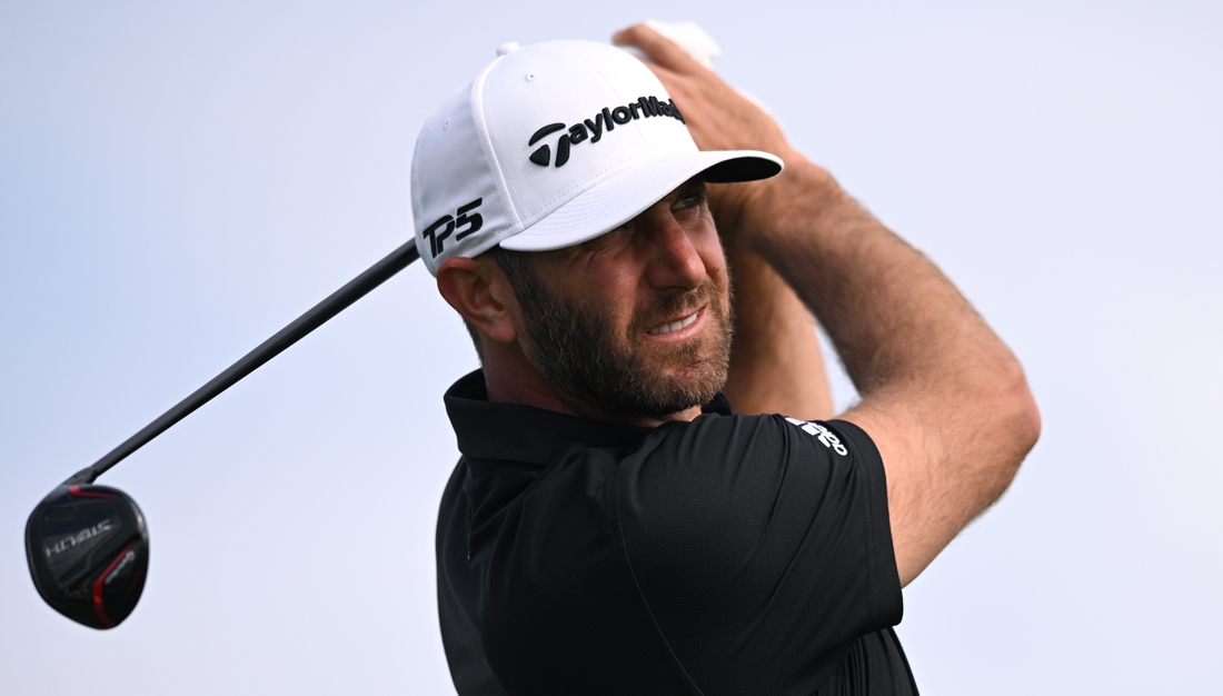 Jan 28, 2022; San Diego, California, USA; Dustin Johnson plays his shot from the second tee during the third round of the Farmers Insurance Open golf tournament at Torrey Pines Municipal Golf Course - South Course. Mandatory Credit: Orlando Ramirez-USA TODAY Sports