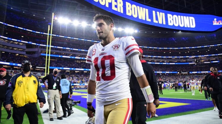 Jan 30, 2022; Inglewood, California, USA; San Francisco 49ers quarterback Jimmy Garoppolo leaves the field after losing to the Los Angeles Rams in the NFC Championship Game at SoFi Stadium. Mandatory Credit: Gary A. Vasquez-USA TODAY Sports