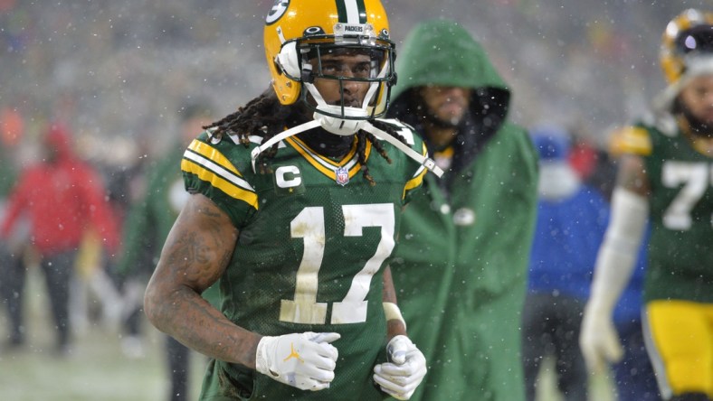 Jan 22, 2022; Green Bay, Wisconsin, USA; Green Bay Packers wide receiver Davante Adams (17) walks off the field after a NFC Divisional playoff football game against the San Francisco 49ers at Lambeau Field. Mandatory Credit: Jeffrey Becker-USA TODAY Sports