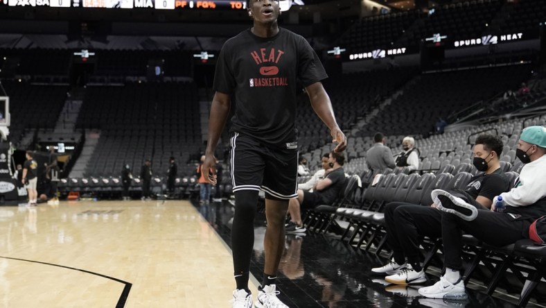 Feb 3, 2022; San Antonio, Texas, USA; Miami Heat guard Victor Oladipo (4) warms up before a game against the San Antonio Spurs. Mandatory Credit: Scott Wachter-USA TODAY Sports