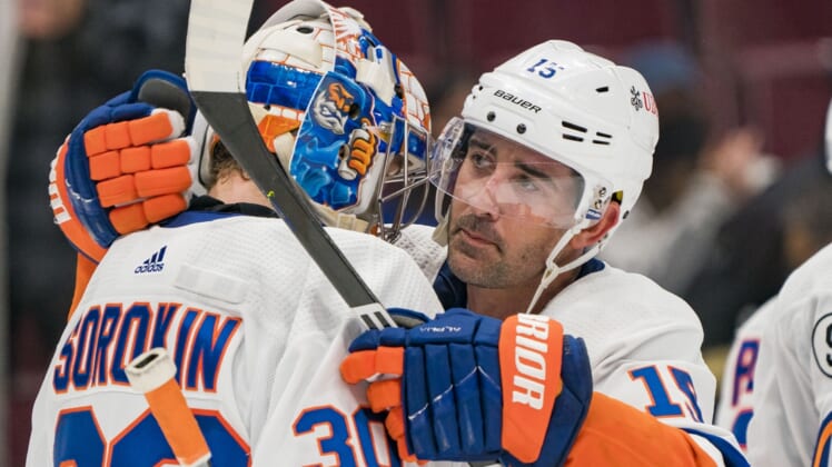 Feb 9, 2022; Vancouver, British Columbia, CAN; New York Islanders forward Cal Clutterbuck (15) and goalie Ilya Sorokin (30) celebrate their victory against the Vancouver Canucks at Rogers Arena. New York won 6-3. Mandatory Credit: Bob Frid-USA TODAY Sports