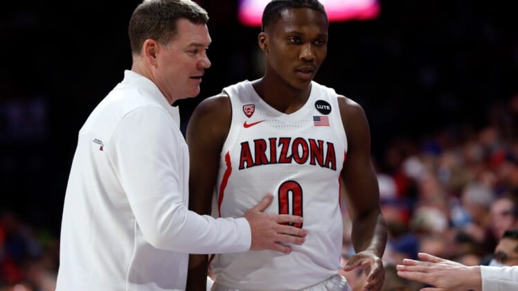 Feb 3, 2022; Tucson, Arizona, USA; Arizona Wildcats head coach Tommy Lloyd talks with guard Bennedict Mathurin (0) during the first half against the UCLA Bruins at McKale Center. Mandatory Credit: The Wildcats beat the Bruins 76-66. Chris Coduto-USA TODAY Sports