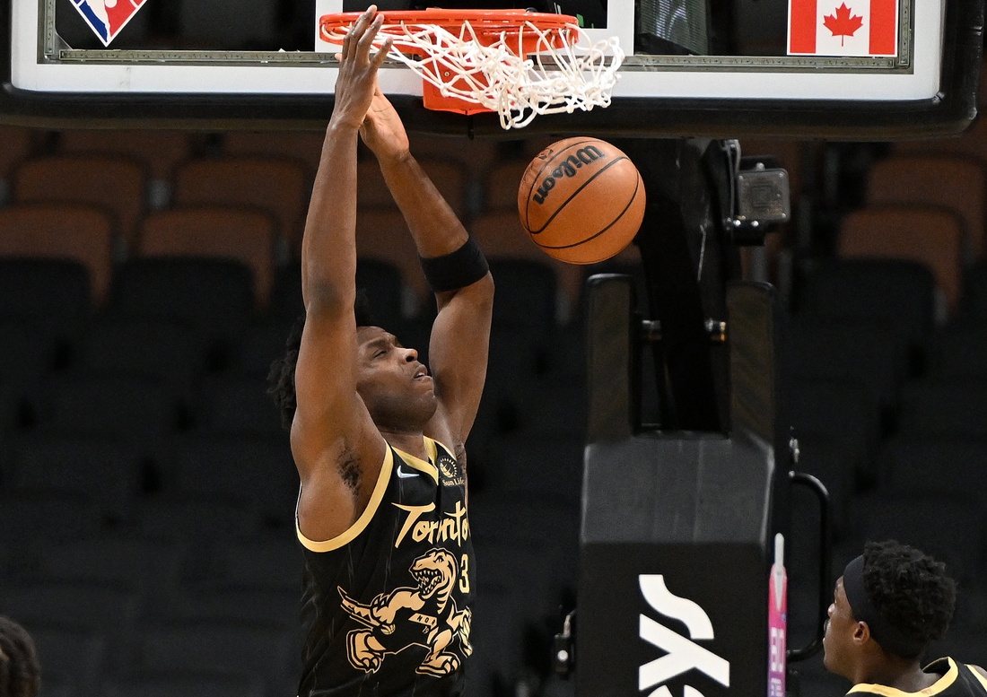 Feb 12, 2022; Toronto, Ontario, CAN;  Toronto Raptors forward OG Anunoby (3) dunks against the Denver Nuggets in the first half at Scotiabank Arena. Mandatory Credit: Dan Hamilton-USA TODAY Sports