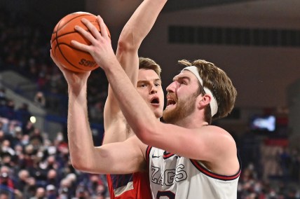 Feb 12, 2022; Spokane, Washington, USA; Gonzaga Bulldogs forward Drew Timme (2) shoots the ball against St. Mary's Gaels center Mitchell Saxen (10) in the second half at McCarthey Athletic Center. Gonzaga won 74-58. Mandatory Credit: James Snook-USA TODAY Sports