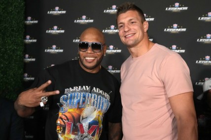 Feb 11, 2022; Los Angeles, CA, USA; Rapper and recording arist Flo Rida (left) poses with Tampa Bay Buccaneers tight end Rob Gronkowski during the NFL Alumni Legends Party Presented by USA TODAY NETWORK Ventures at Avalon Hollywood. Mandatory Credit: Kirby Lee-USA TODAY Sports