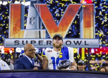 Feb 13, 2022; Inglewood, CA, USA; Los Angeles Rams wide receiver Cooper Kupp (10) holds the Lombardi Trophy as he is interviewed by NBC sports host Mike Tirico after defeating the Cincinnati Bengals during Super Bowl LVI at SoFi Stadium. Mandatory Credit: Mark J. Rebilas-USA TODAY Sports