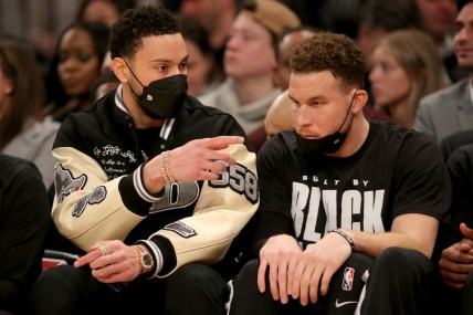 Feb 16, 2022; New York, New York, USA; Brooklyn Nets guard Ben Simmons (10) talks to forward Blake Griffin (2) on the bench during the first quarter against the New York Knicks at Madison Square Garden. Mandatory Credit: Brad Penner-USA TODAY Sports