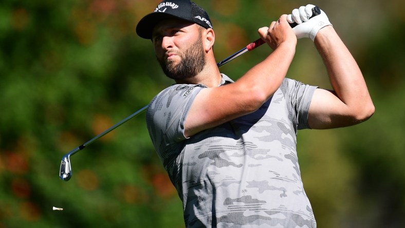 Feb 17, 2022; Pacific Palisades, California, USA; Jon Rahm hits from the fourth tee during the first round of the Genesis Invitational golf tournament. Mandatory Credit: Gary A. Vasquez-USA TODAY Sports