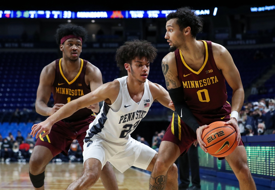 Feb 17, 2022; University Park, Pennsylvania, USA; Minnesota Golden Gophers guard Payton Willis (0) controls the ball against Penn State Nittany Lions guard Dallion Johnson (23) during the second half at Bryce Jordan Center. Penn State won 67-46. Mandatory Credit: Matthew OHaren-USA TODAY Sports