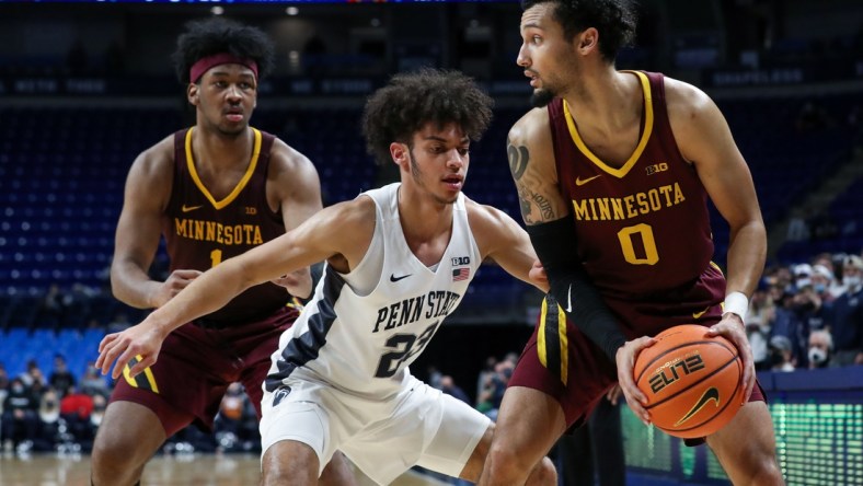 Feb 17, 2022; University Park, Pennsylvania, USA; Minnesota Golden Gophers guard Payton Willis (0) controls the ball against Penn State Nittany Lions guard Dallion Johnson (23) during the second half at Bryce Jordan Center. Penn State won 67-46. Mandatory Credit: Matthew OHaren-USA TODAY Sports