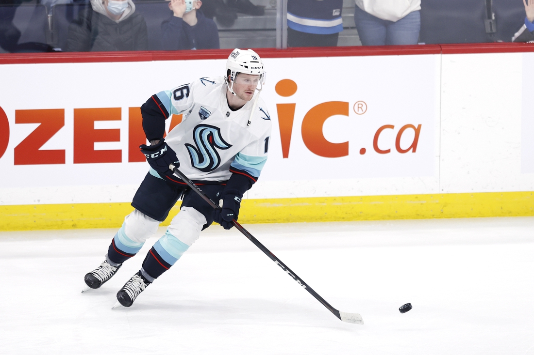 Feb 17, 2022; Winnipeg, Manitoba, CAN; Seattle Kraken left wing Jared McCann (16) in warm up before a game against the Winnipeg Jets at Canada Life Centre. Mandatory Credit: James Carey Lauder-USA TODAY Sports