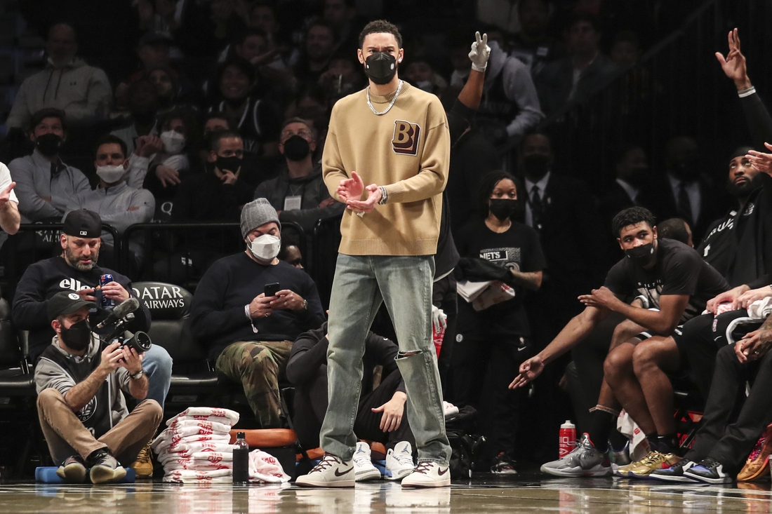 Feb 17, 2022; Brooklyn, New York, USA; Brooklyn Nets guard Ben Simmons (10) applauds for his teammates in the third quarter against the Washington Wizards at Barclays Center. Mandatory Credit: Wendell Cruz-USA TODAY Sports