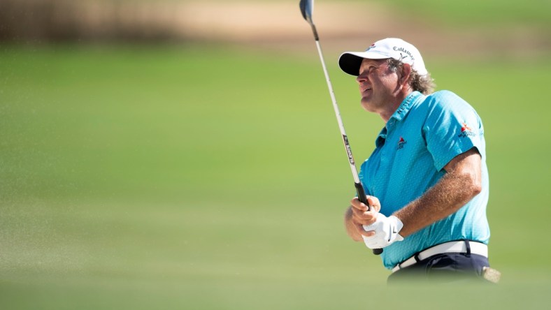 Retief Goosen (RSA) hits a shot from a bunker on the 18th hole during the first round of the Chubb Classic, Friday, Feb. 18, 2022, at Tibur  n Golf Club at The Ritz-Carlton Golf Resort in Naples, Fla.

Chubb Classic first round, Feb. 18, 2022