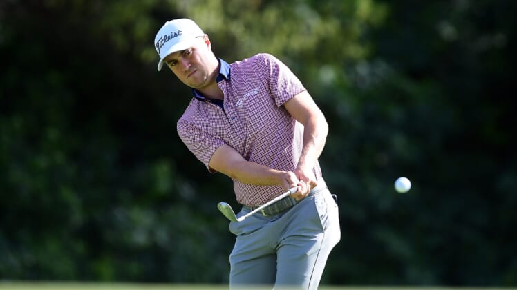 Feb 19, 2022; Pacific Palisades, California, USA; Justin Thomas plays his shot onto the twelfth green during the third round of the Genesis Invitational golf tournament. Mandatory Credit: Gary A. Vasquez-USA TODAY Sports