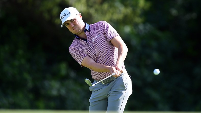 Feb 19, 2022; Pacific Palisades, California, USA; Justin Thomas plays his shot onto the twelfth green during the third round of the Genesis Invitational golf tournament. Mandatory Credit: Gary A. Vasquez-USA TODAY Sports