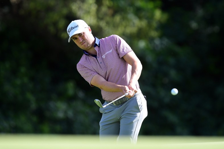 Feb 19, 2022; Pacific Palisades, California, USA; Justin Thomas plays his shot onto the twelfth green during the third round of the Genesis Invitational golf tournament. Mandatory Credit: Gary A. Vasquez-USA TODAY Sports