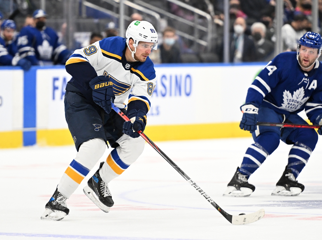 Feb 19, 2022; Toronto, Ontario, CAN;   St. Louis Blues forward Pavel Buchnevich (89) skates with the puck against the Toronto Maple Leafs in the first period at Scotiabank Arena. Mandatory Credit: Dan Hamilton-USA TODAY Sports