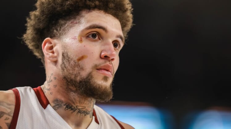 Teddy Allen (0) is cut on the face after a foul as the New Mexico State Aggies face off against the Grand Canyon Lopes at GCU Arena in Phoenix on Saturday, Feb. 19, 2022.Nmsu Gcu 37