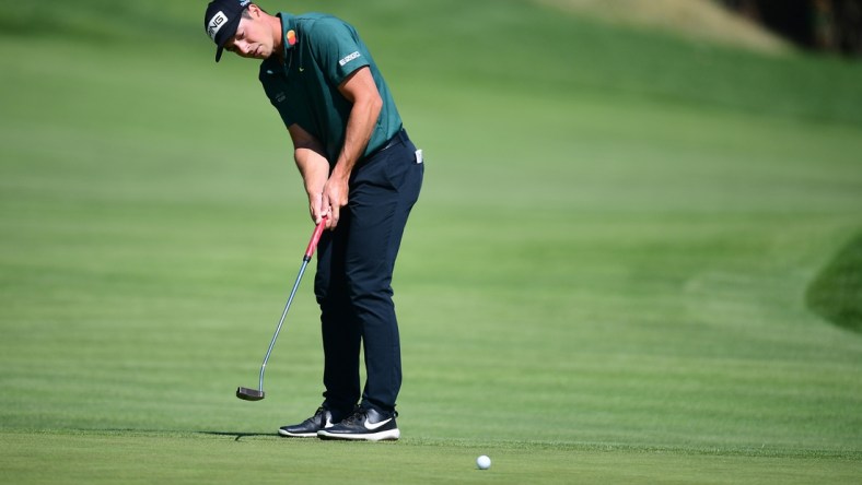 Feb 20, 2022; Pacific Palisades, California, USA; Viktor Hovland putts on the fourth green during the final round of the Genesis Invitational golf tournament. Mandatory Credit: Gary A. Vasquez-USA TODAY Sports