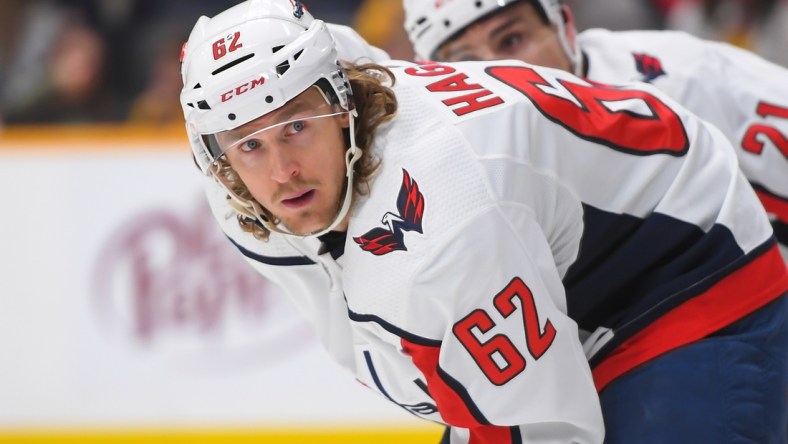 Feb 15, 2022; Nashville, Tennessee, USA;   Washington Capitals left wing Carl Hagelin (62) awaits the face-off against the Nashville Predators during the first period at Bridgestone Arena. Mandatory Credit: Steve Roberts-USA TODAY Sports