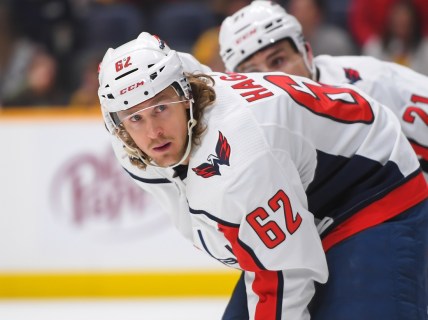 Feb 15, 2022; Nashville, Tennessee, USA;   Washington Capitals left wing Carl Hagelin (62) awaits the face-off against the Nashville Predators during the first period at Bridgestone Arena. Mandatory Credit: Steve Roberts-USA TODAY Sports
