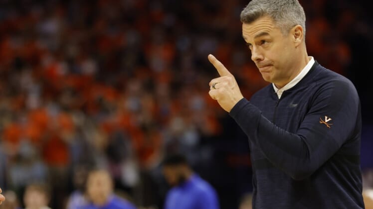 Feb 23, 2022; Charlottesville, Virginia, USA; Virginia Cavaliers head coach Tony Bennett acknowledges one of his players from the bench against the Duke Blue Devils in the second half at John Paul Jones Arena. Mandatory Credit: Geoff Burke-USA TODAY Sports