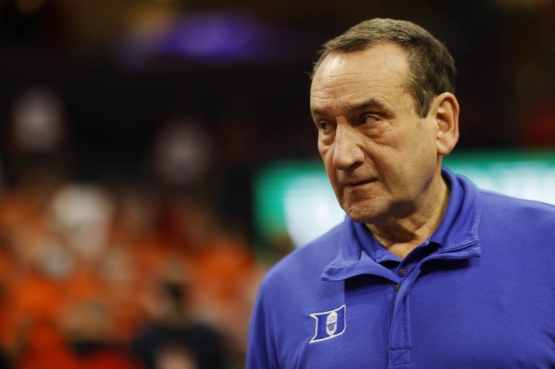 Feb 23, 2022; Charlottesville, Virginia, USA; Duke Blue Devils head coach Mike Krzyzewski walks onto the court for the final time at John Paul Jones Arena prior to the game against the Virginia Cavaliers. Mandatory Credit: Geoff Burke-USA TODAY Sports