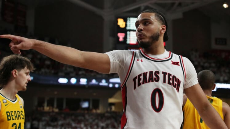 Feb 16, 2022; Lubbock, Texas, USA;  Texas Tech Red Raiders guard Kevin Obanor (0) signals during the game against the Baylor Bears in the second half at United Supermarkets Arena. Mandatory Credit: Michael C. Johnson-USA TODAY Sports