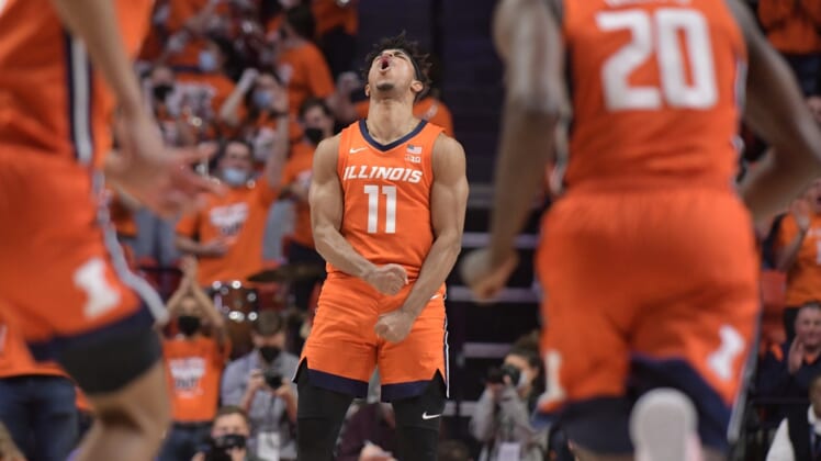 Feb 24, 2022; Champaign, Illinois, USA;  Illinois Fighting Illini guard Alfonso Plummer (11) reacts after hitting a three point shot during the first half against the Ohio State Buckeyes at State Farm Center. Mandatory Credit: Ron Johnson-USA TODAY Sports