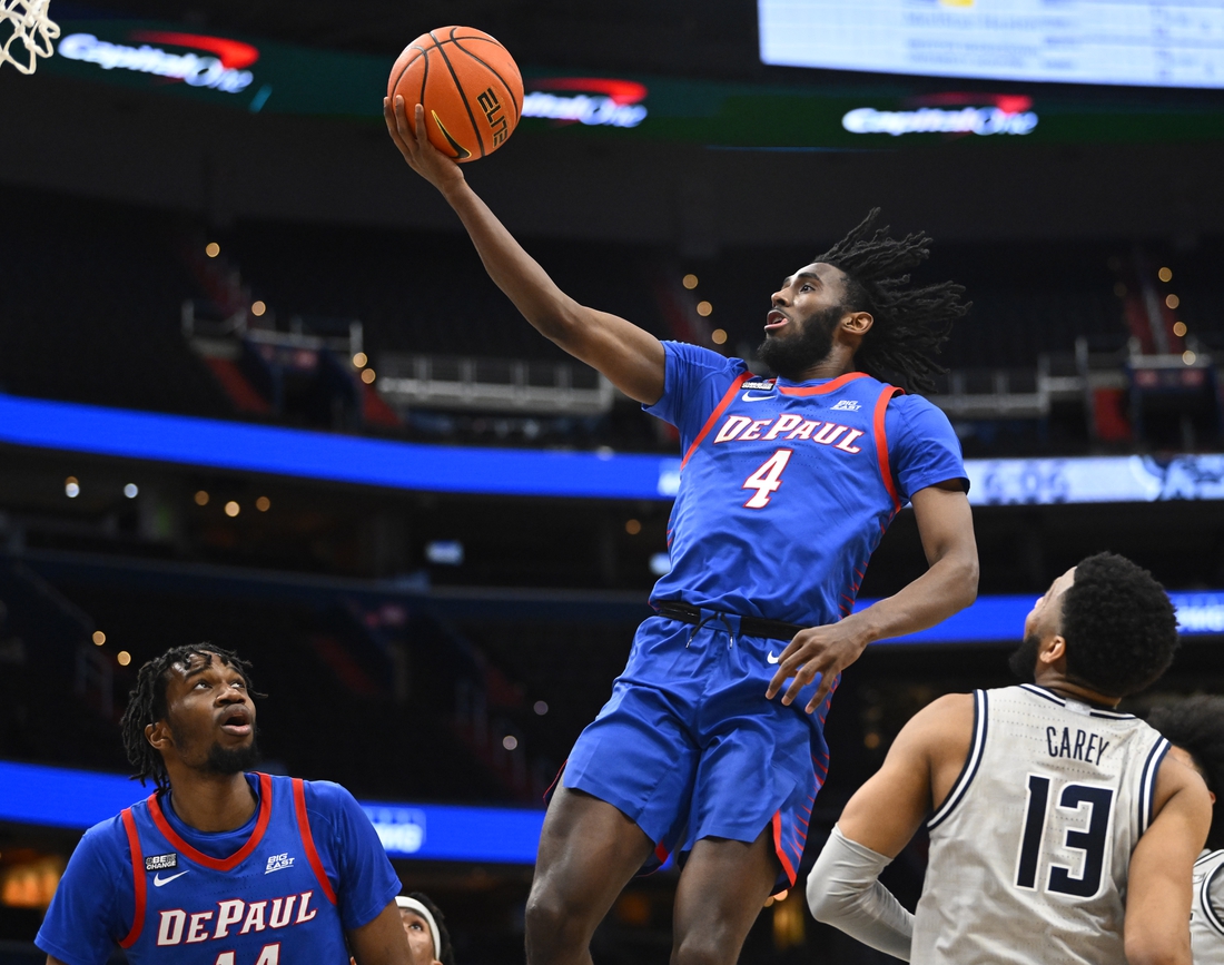 Feb 24, 2022; Washington, District of Columbia, USA; DePaul Blue Demons guard Javon Freeman-Liberty (4) shoots against the Georgetown Hoyas during the first half at Capital One Arena. Mandatory Credit: Brad Mills-USA TODAY Sports