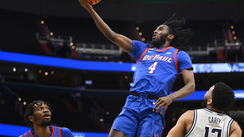 Feb 24, 2022; Washington, District of Columbia, USA; DePaul Blue Demons guard Javon Freeman-Liberty (4) shoots against the Georgetown Hoyas during the first half at Capital One Arena. Mandatory Credit: Brad Mills-USA TODAY Sports