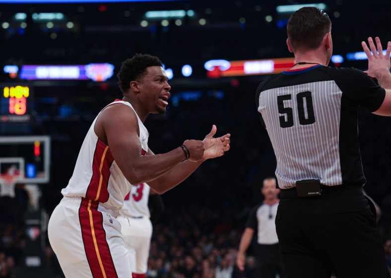 Feb 25, 2022; New York, New York, USA; Miami Heat guard Kyle Lowry (7) talks with referee Gediminas Petraitis (50) during the first quarter against the New York Knicks at Madison Square Garden. Mandatory Credit: Vincent Carchietta-USA TODAY Sports
