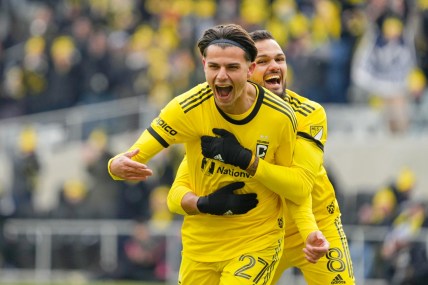 Feb 26, 2022; Columbus, OH, USA; Columbus Crew forward Miguel Berry (27) celebrates after scoring a goal against the Vancouver Whitecaps with midfielder Artur (8) during the first half at Lower.com Field. Mandatory Credit: Joshua Bickel-USA TODAY Sports