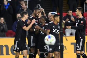 Feb 26, 2022; Washington, District of Columbia, USA; D.C. United forward Michael Estrada (7) celebrates with teammates after scoring a goal against the Charlotte FC in the first half at Audi Field. Mandatory Credit: Brad Mills-USA TODAY Sports