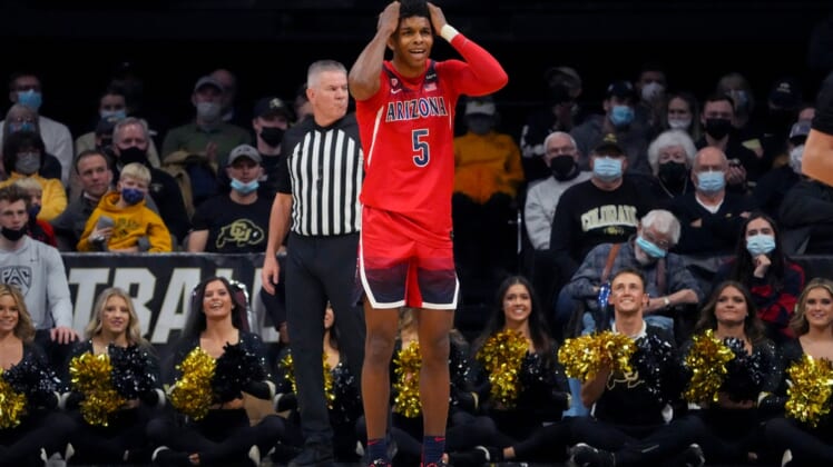 Feb 26, 2022; Boulder, Colorado, USA; Arizona Wildcats guard Justin Kier (5) reacts during the second half against the Colorado Buffaloes at the CU Events Center. Mandatory Credit: Ron Chenoy-USA TODAY Sports