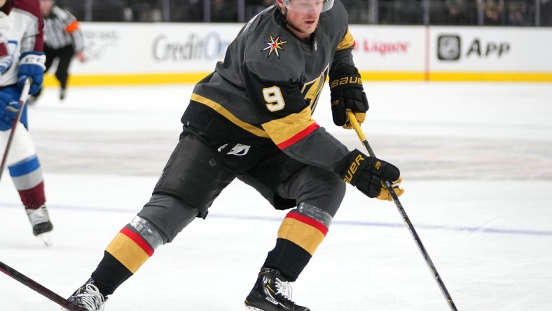 Feb 26, 2022; Las Vegas, Nevada, USA; Vegas Golden Knights center Jack Eichel (9) controls the puck during the second period against the Colorado Avalanche at T-Mobile Arena. Mandatory Credit: Stephen R. Sylvanie-USA TODAY Sports