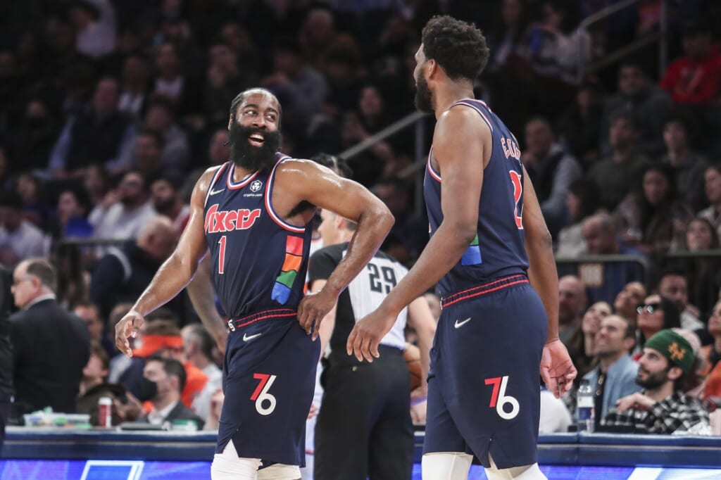 Feb 27, 2022; New York, New York, USA;  Philadelphia 76ers guard James Harden (1) and center Joel Embiid (21) check back into the game in the second quarter against the New York Knicks at Madison Square Garden. Mandatory Credit: Wendell Cruz-USA TODAY Sports