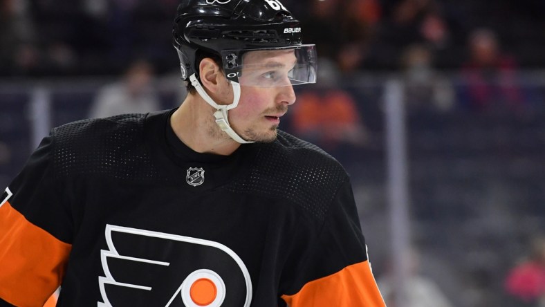 Feb 21, 2022; Philadelphia, Pennsylvania, USA; Philadelphia Flyers defenseman Justin Braun (61) against the Carolina Hurricanes at Wells Fargo Center. Mandatory Credit: Eric Hartline-USA TODAY Sports