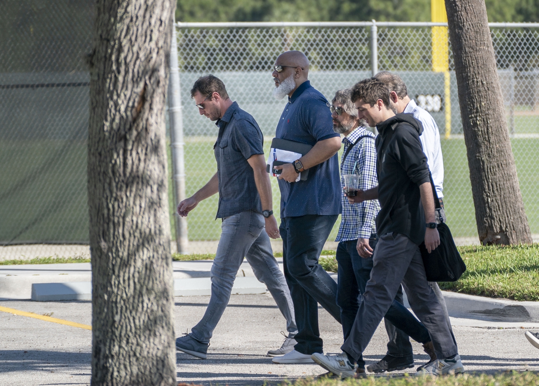 Feb 28, 2022; Jupiter, FL, USA; New York Mets pitcher Max Scherzer, far left, Major League Baseball Players Association executive director Tony Clark, second from left, arrive for negotiations with the players union in an attempt to reach an agreement to salvage March 31 openers and a 162-game season, Feb. 28, 2022, at Roger Dean Stadium in  Jupiter, Florida. Mandatory Credit: Greg Lovett-USA TODAY NETWORK