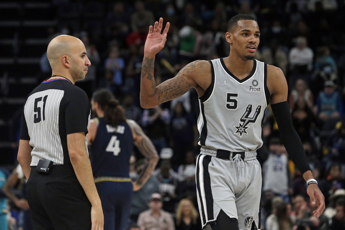 Feb 28, 2022; Memphis, Tennessee, USA; San Antonio Spurs guard Dejounte Murray (5) reacts after being ejected from the game against the Memphis Grizzles at FedExForum. Mandatory Credit: Petre Thomas-USA TODAY Sports