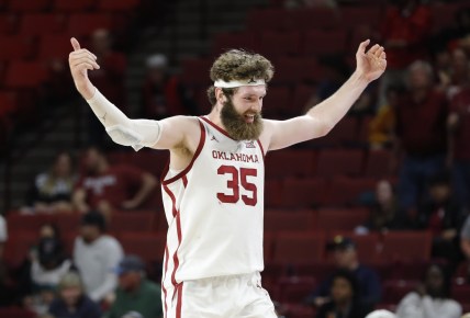 Mar 1, 2022; Norman, Oklahoma, USA; Oklahoma Sooners forward Tanner Groves (35) celebrates after defeating the West Virginia Mountaineers at Lloyd Noble Center. Oklahoma won 72-59. Mandatory Credit: Alonzo Adams-USA TODAY Sports