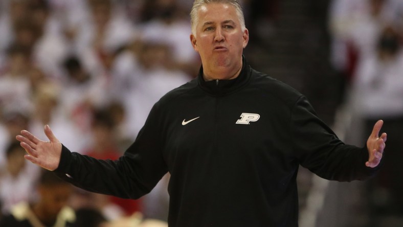 Mar 1, 2022; Madison, Wisconsin, USA; Purdue Boilermakers head coach Matt Painter  disputes a referee's call during the game with the Wisconsin Badgers at the Kohl Center. Mandatory Credit: Mary Langenfeld-USA TODAY Sports