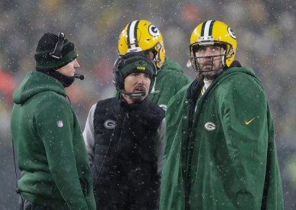 Green Bay Packers head coach Matt LaFleur talks with quarterback Aaron Rodgers (12) in a time out during their NFL divisional round football playoff game Saturday January 22, 2022, at Lambeau Field in Green Bay, Wis.

Xxx Apc Packvs49ers 0122221589djp Jpg Usa Wi