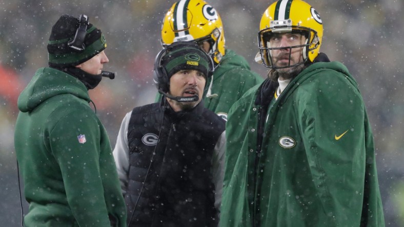 Green Bay Packers head coach Matt LaFleur talks with quarterback Aaron Rodgers (12) in a time out during their NFL divisional round football playoff game Saturday January 22, 2022, at Lambeau Field in Green Bay, Wis.

Xxx Apc Packvs49ers 0122221589djp Jpg Usa Wi