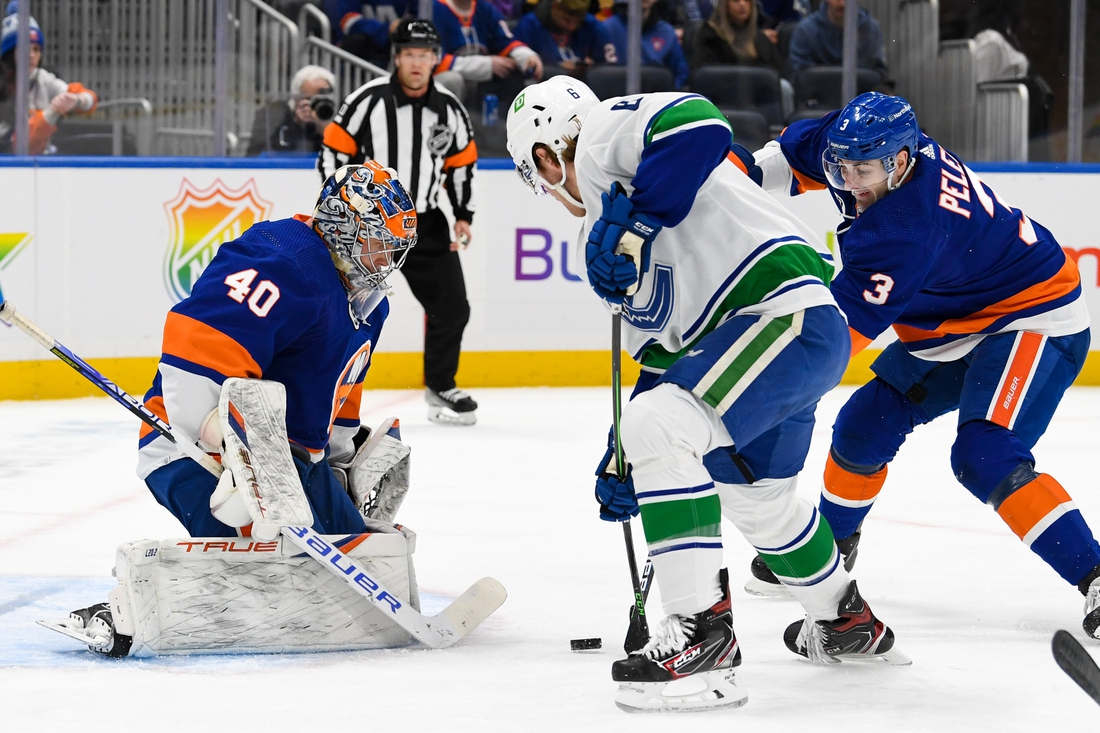 canucks-score-twice-in-third-period-to-edge-islanders