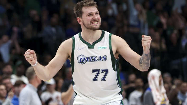 Mar 3, 2022; Dallas, Texas, USA;  Dallas Mavericks guard Luka Doncic (77) reacts during the second half against the Golden State Warriors at American Airlines Center. Mandatory Credit: Kevin Jairaj-USA TODAY Sports